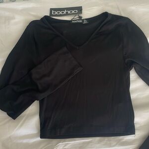 Black long sleeve v neck cut brand new with tags